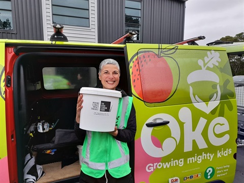Joany with biochar for an new school garden (1).jpg